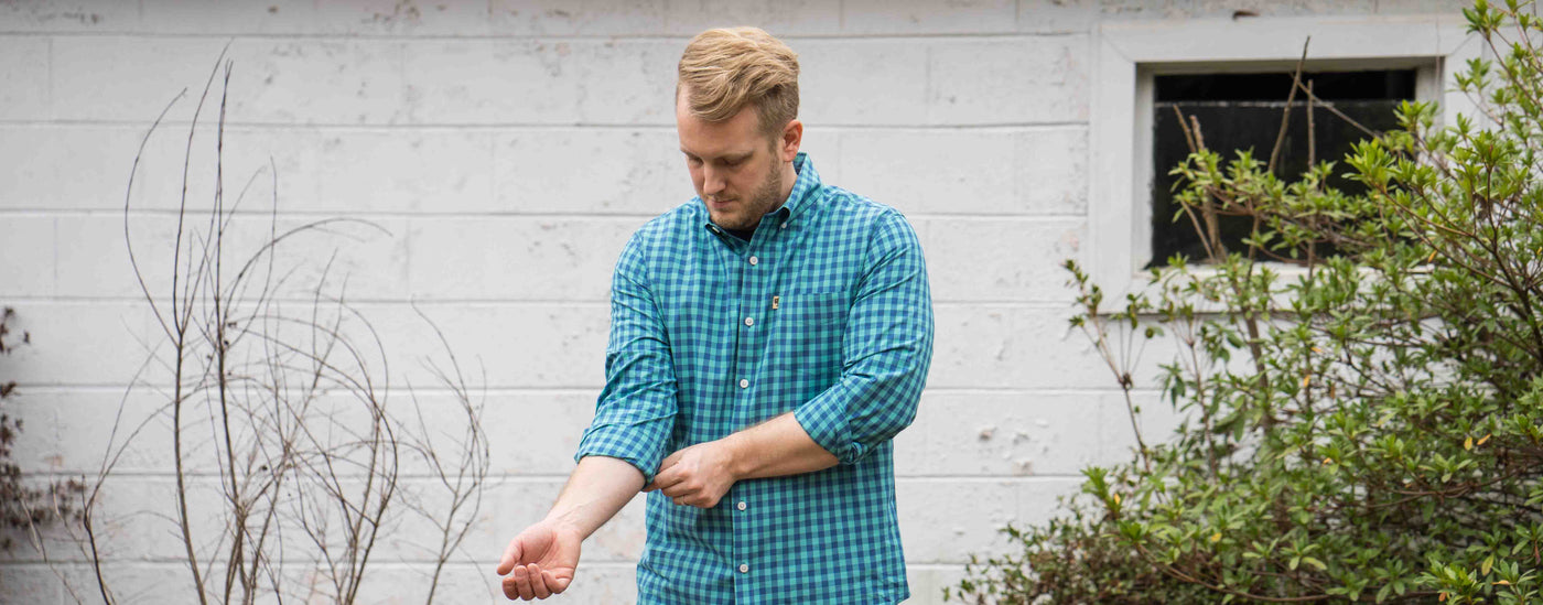 A man wearing Buffalo Jackson gingham shirt.