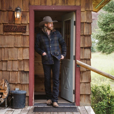 At Doorway in Jackson in Cowboy Hat with Ellis Navy Jacket