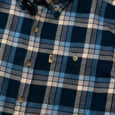 Close-up of fabric texture on Fairbanks Flannel Shirt Navy Lake Plaid showing pre-washed softness and midweight flannel weave