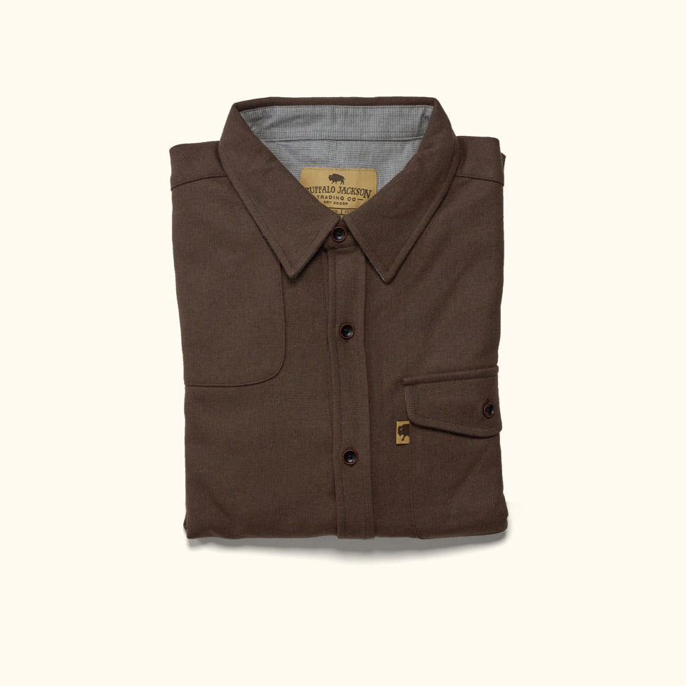 Flat lay of Gunnison brown wool blend flannel shirt showing full front, pocket details, wood buttons visible