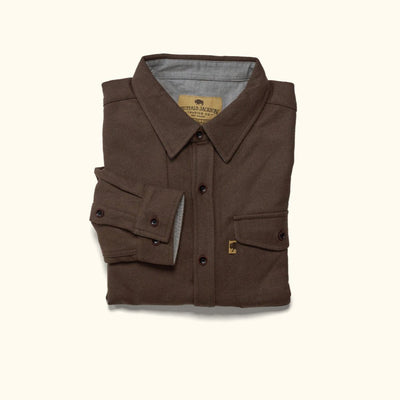 Detail of cuff, sleeve and wood buttons on brown Gunnison wool blend flannel shirt showing artisanal finish