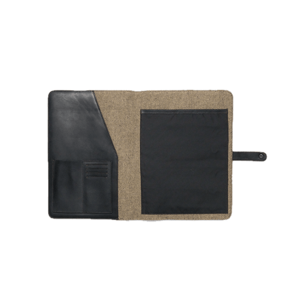 Two-tone leather and fabric pouch with a black flap on a white background