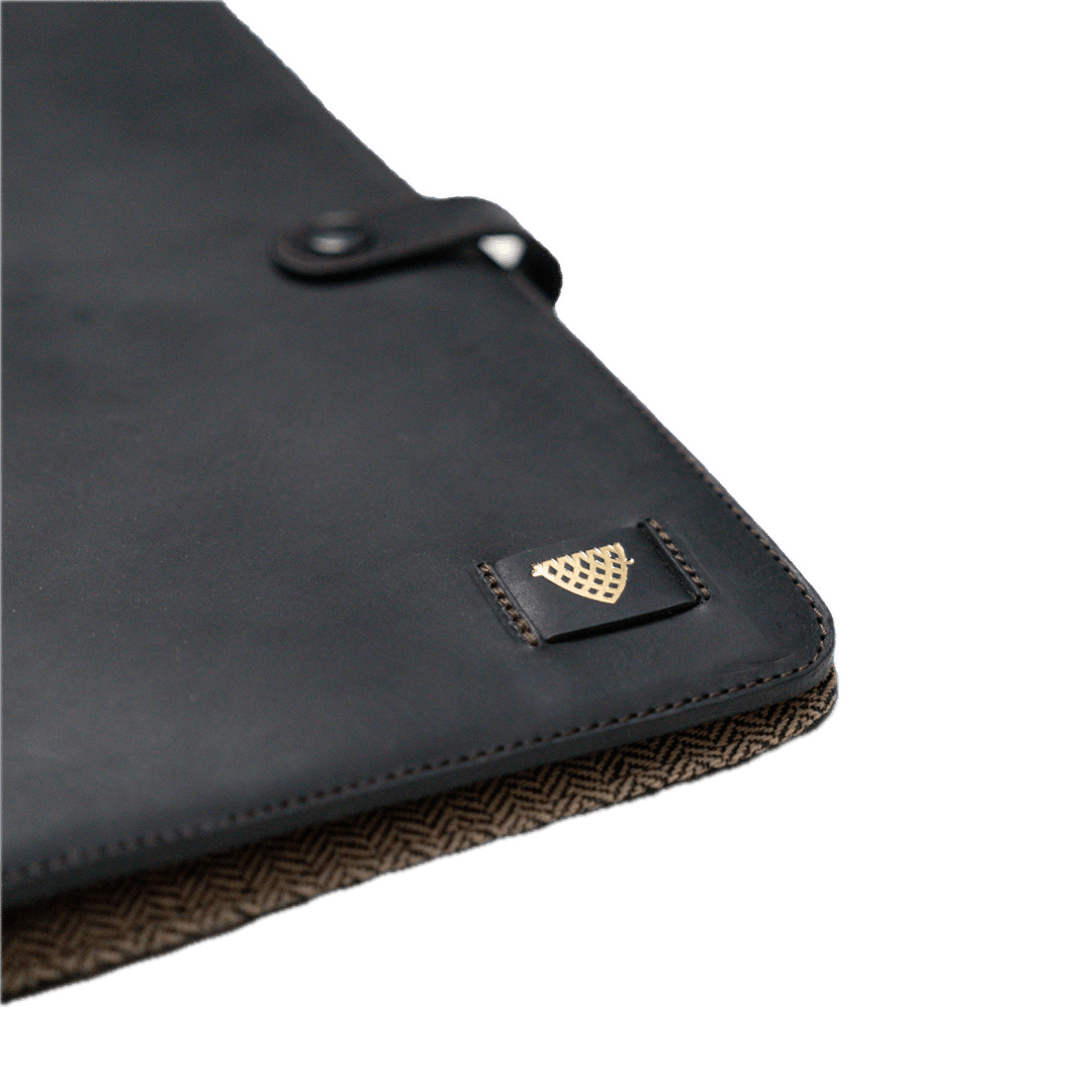 Black leather case with a brand logo on a white background