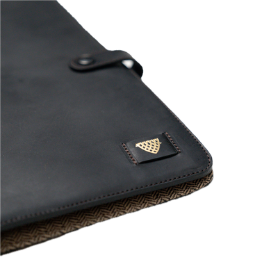 Black leather case with a brand logo on a white background