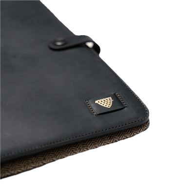 Black leather case with a brand logo on a white background