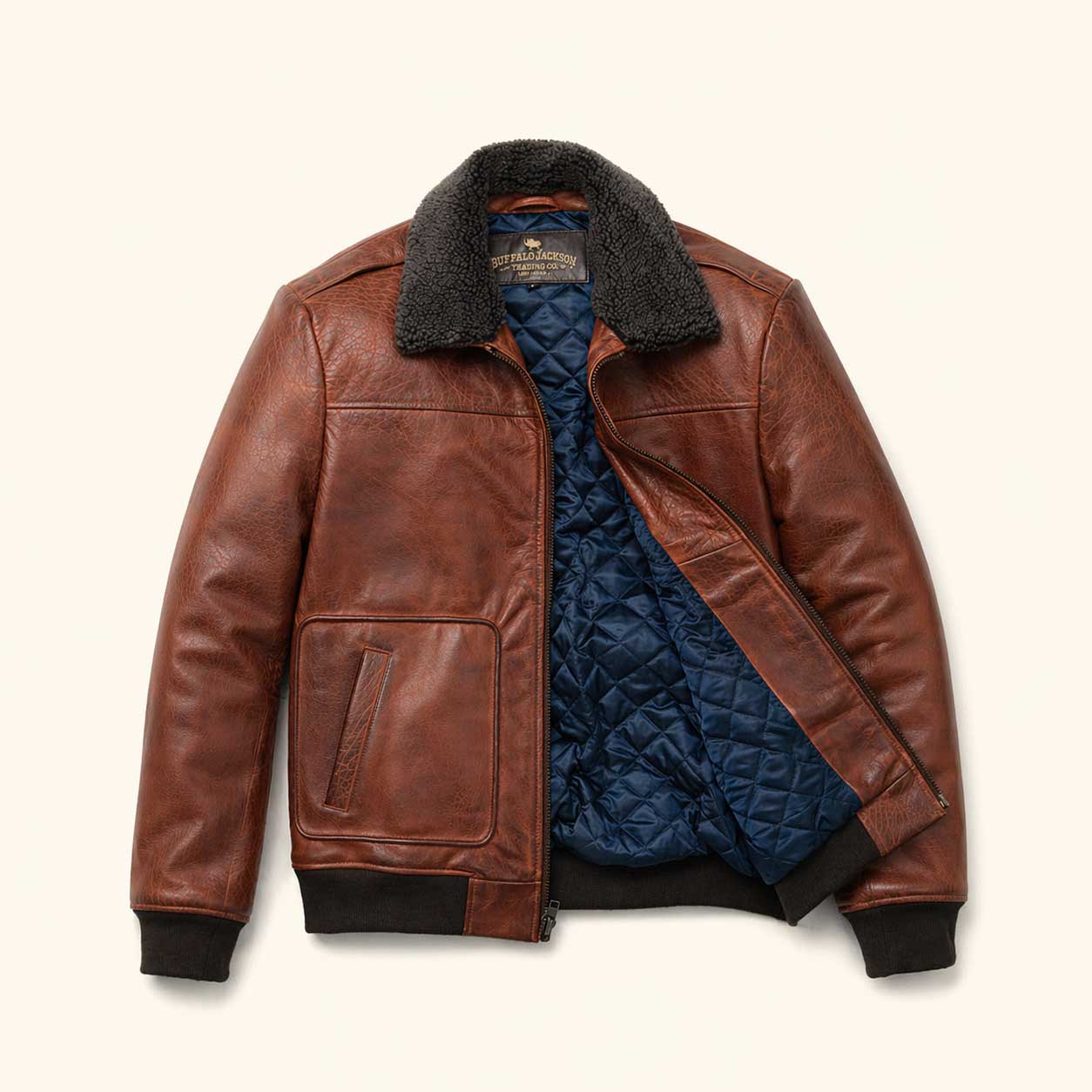 Buffalo Grain Brown water buffalo leather bomber jacket showing full grain leather texture and natural distressed finish, front view with zipper closed.