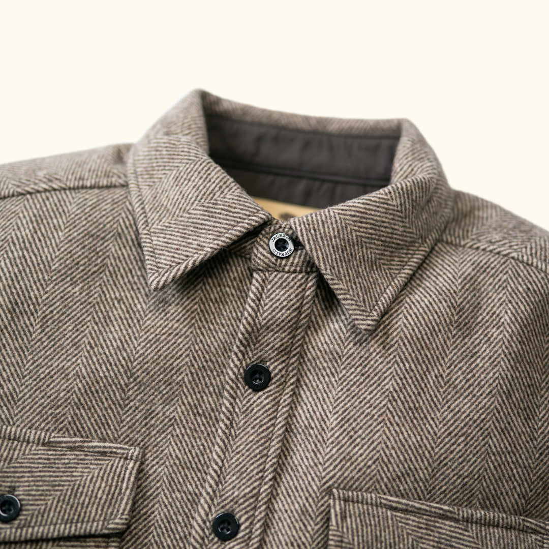 Close-up of collar and buttons on Riverton Wool Shirt Jac Charcoal Shadow Gray highlighting brown horn buttons and reinforced stitching