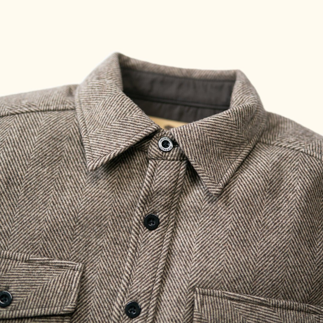 Close-up of collar and buttons on Riverton Wool Shirt Jac Charcoal Shadow Gray highlighting brown horn buttons and reinforced stitching