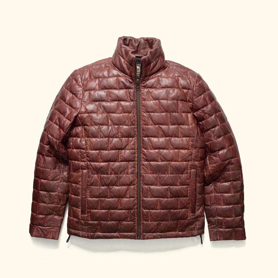 A mahogany brown leather light down jacket with a quilted pattern and a standing collar, zipper front, and side zip pockets.