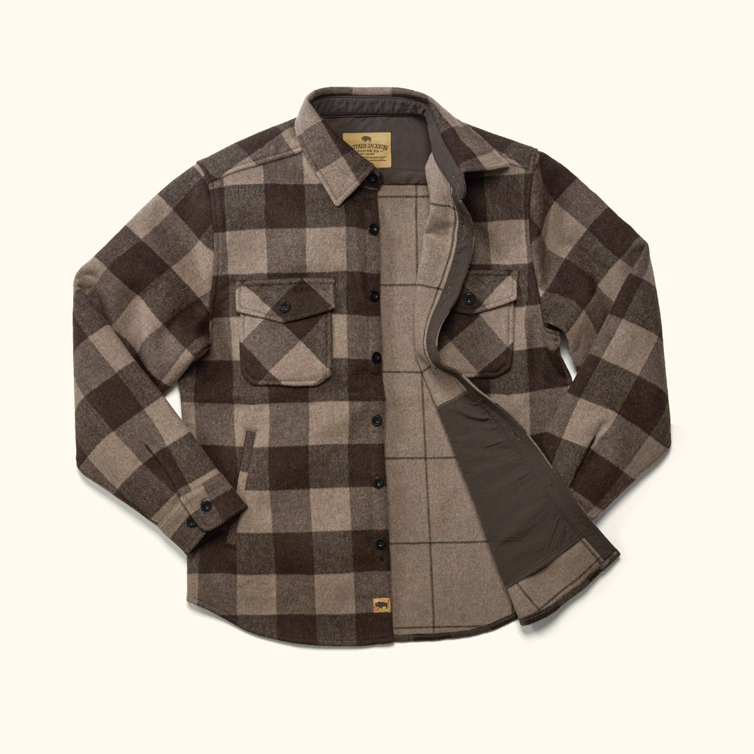 Flat lay of Yukon Wool Shirt Jac Buffalo Check showing distinctive buffalo check pattern and mid-to-heavy weight brushed wool fabric