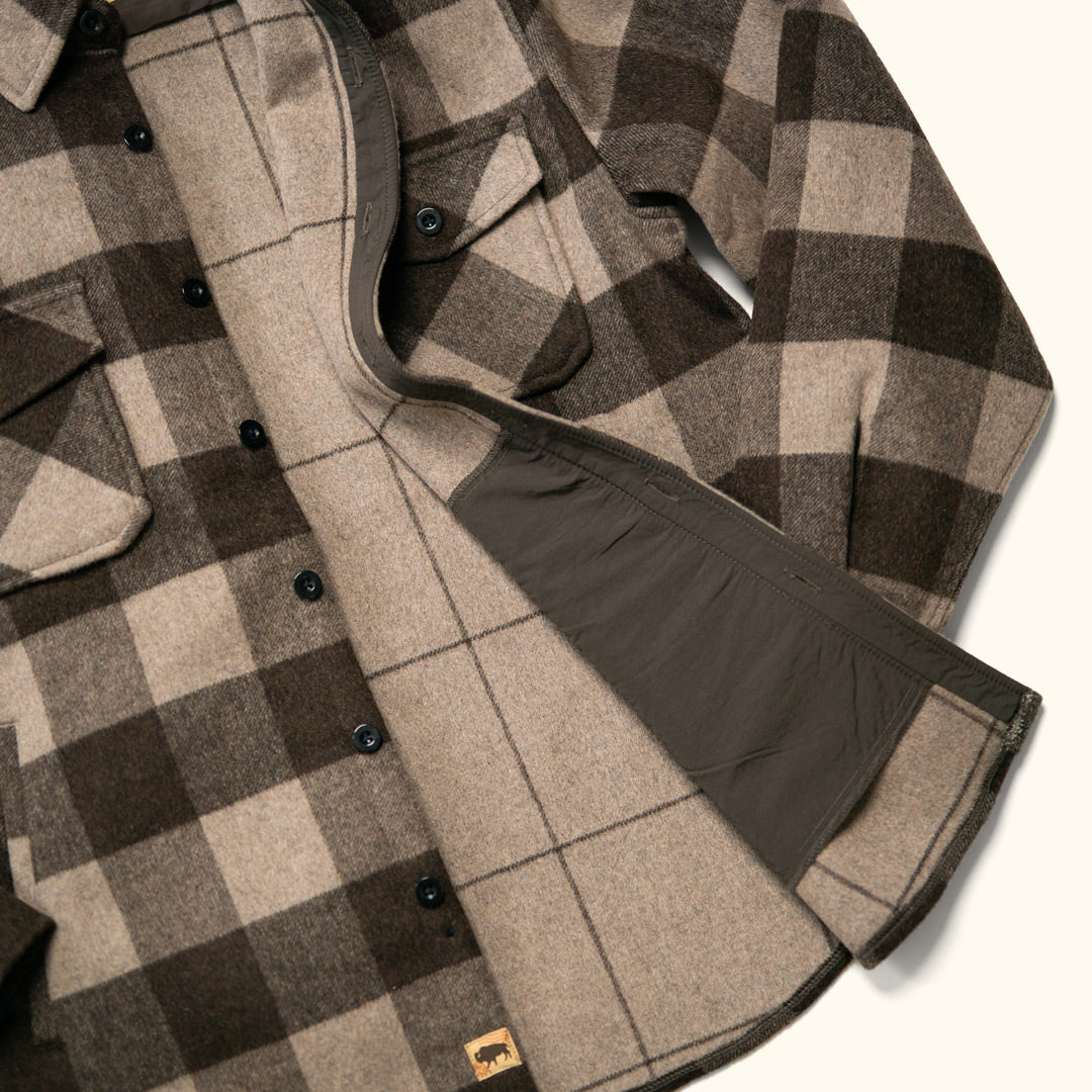 Fabric texture close-up of Yukon Wool Shirt Jac Buffalo Check revealing soft nap, warm wool-poly blend material, and rugged weave