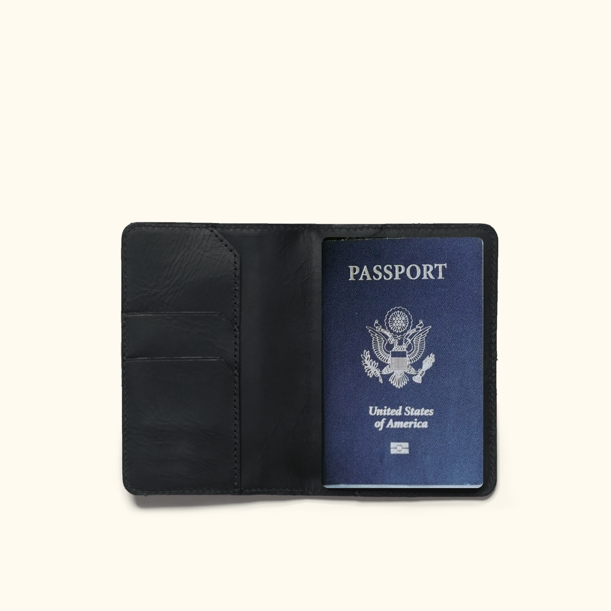 Jefferson Leather Passport Wallet in Vintage Black, open with a passport inside.