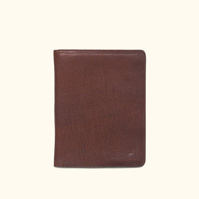 Elegant Roosevelt travel padfolio in rich buffalo grain leather with organizational pockets and sophisticated design.