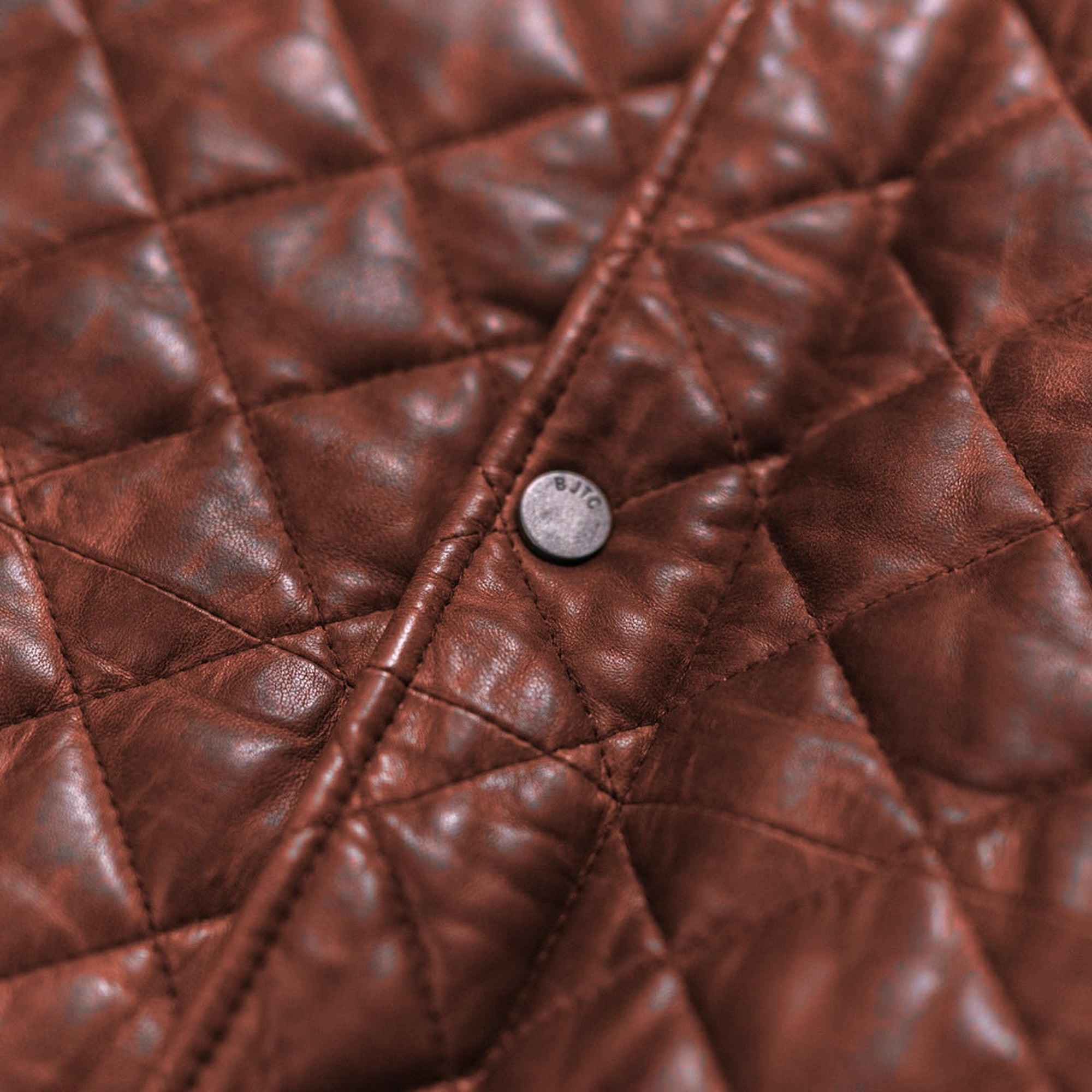 Highlands Quilted Leather Jacket in Whiskey Brown, snap and diamond quilting detail.