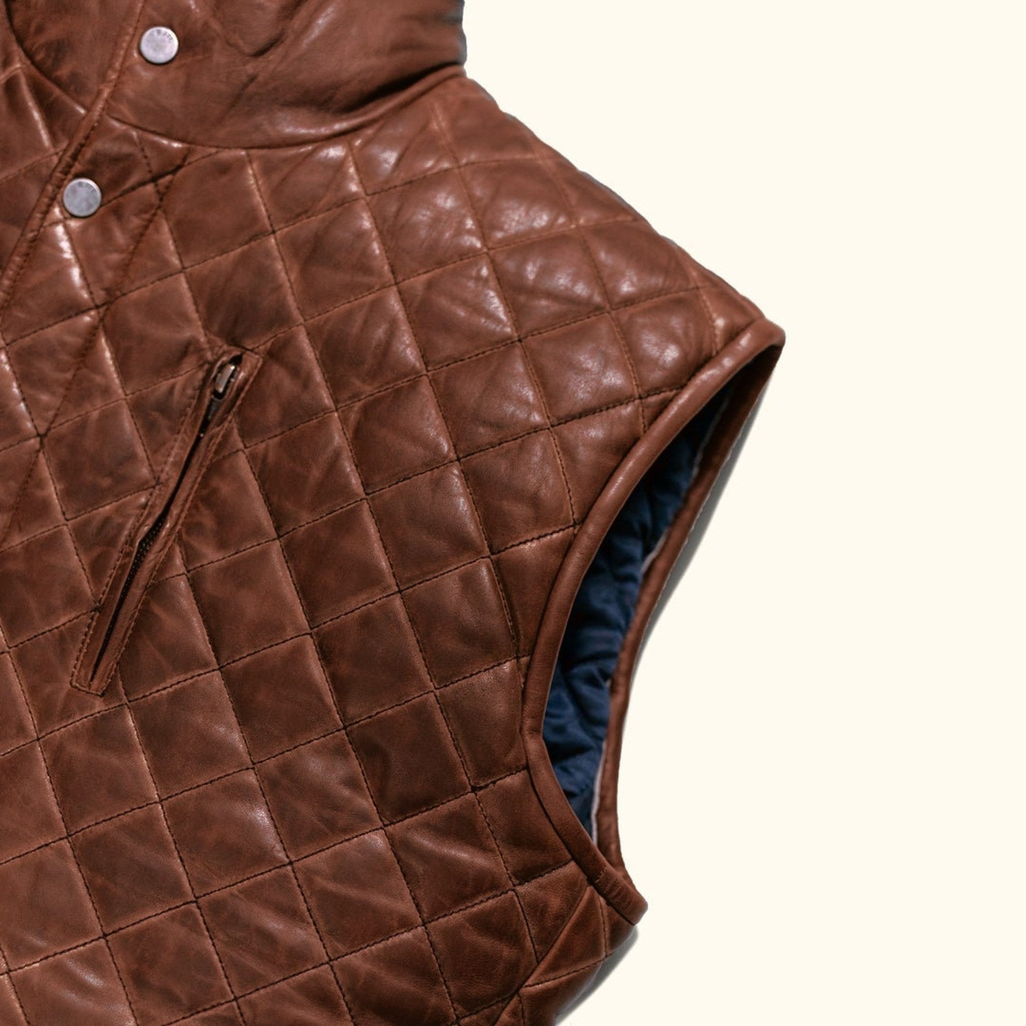 Highlands Quilted Leather Vest in Whiskey Brown, armhole and side quilting detail.