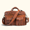 Vintage brown leather duffle bag with multiple pockets, buckles, and adjustable shoulder strap for stylish, practical use.