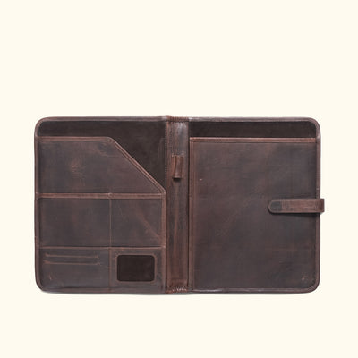 Luxurious dark oak full-grain leather padfolio, ideal for organizing documents and notes, with vintage appeal.