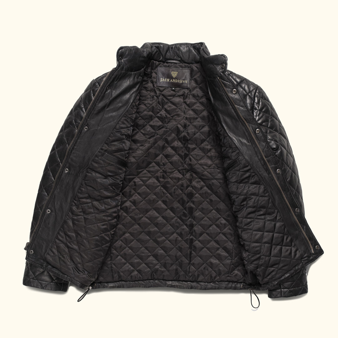 The Highland Quilted Leather Jacket showcases a sleek, minimalist design with a hint of rugged charm, making it an essential piece for the modern man.