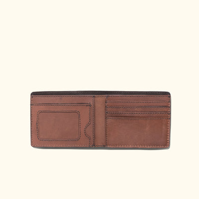 Compact and stylish amber brown leather wallet with embossed buffalo logo and smooth texture.