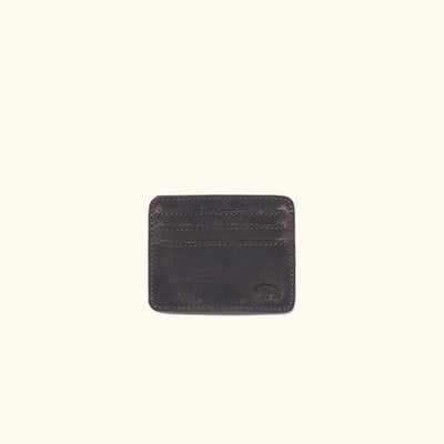 Dark oak Roosevelt leather slim ID wallet with visible stitching and embossed logo.
