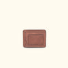 Amber brown Roosevelt slim ID leather wallet featuring a clear ID window and minimalist stitching.