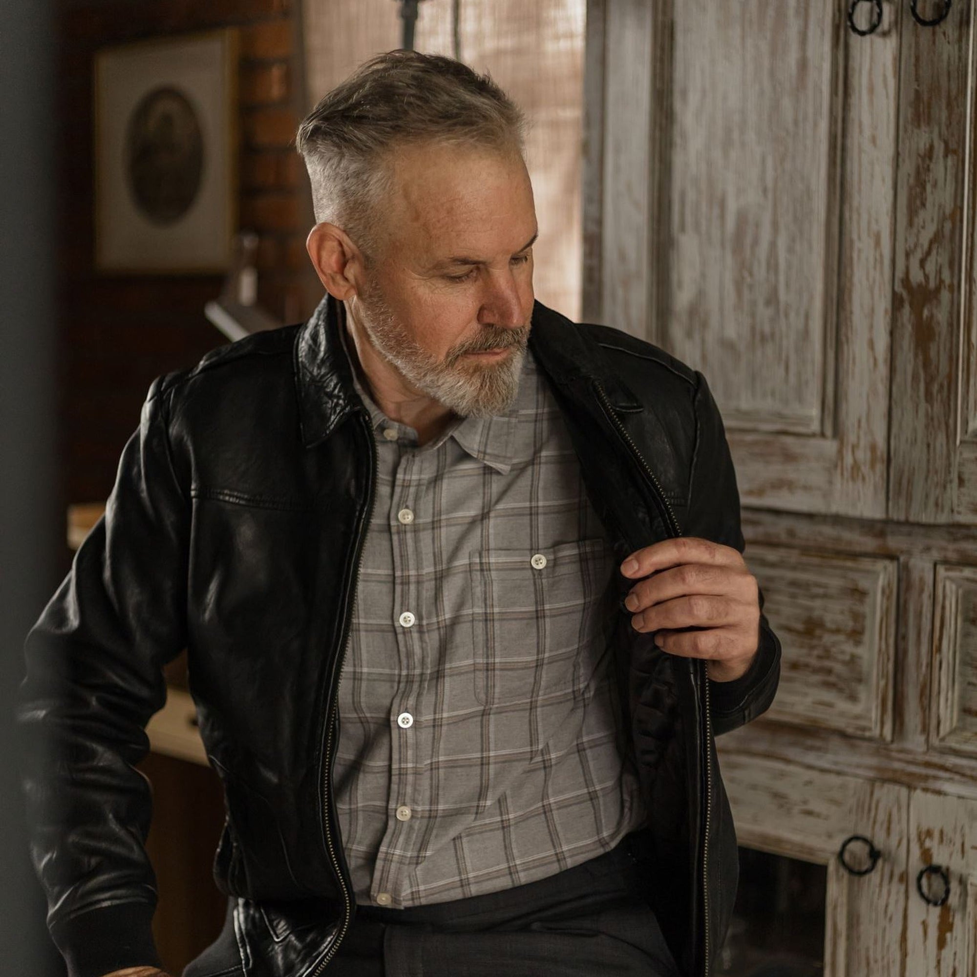 Windsor Cotton Shirt in Stone Pane worn under a black leather jacket