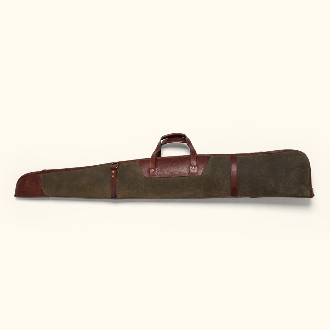 Vintage leather and canvas shotgun case