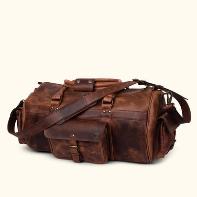 Men's buffalo leather duffle bag in dark oak with ample storage, secure straps, and rugged design for versatile usage.