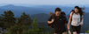 Couple hiking in Linville Gorge Chimneys