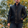 The sophisticated black finish makes this jacket a versatile addition to any wardrobe, suitable for both casual and formal occasions.