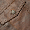 Detailed leather pocket with a Buffalo Jackson button, highlighting the quality craftsmanship.