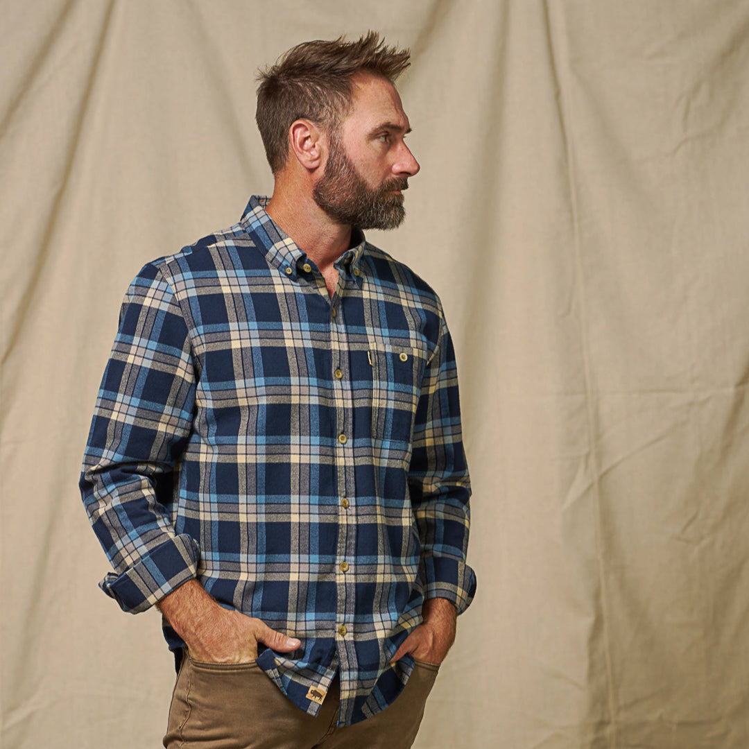 Fairbanks Flannel Shirt being worn outdoors rugged styling navy lake plaid – ready for hiking or casual wear