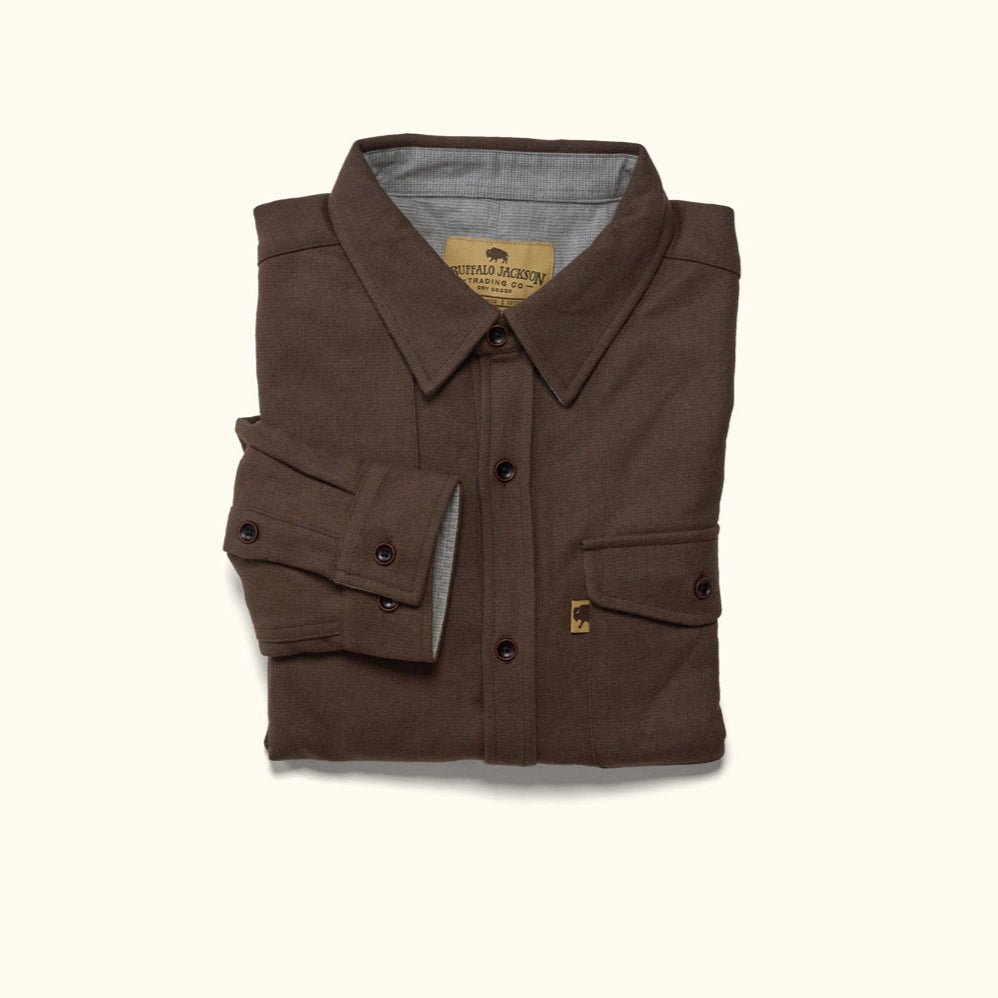 Detail of cuff, sleeve and wood buttons on brown Gunnison wool blend flannel shirt showing artisanal finish