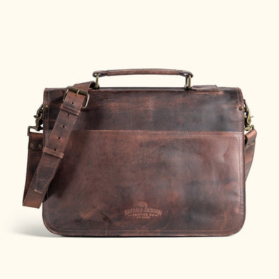 Luxurious dark oak leather briefcase with a rich finish and functional design, perfect for professional settings.