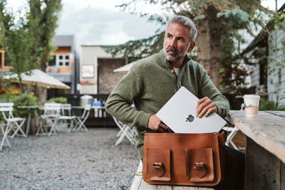 Laptop - Opening Leather Briefcase at Coffee Shop