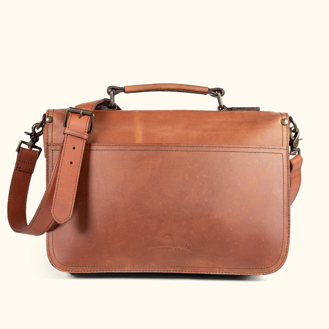 Amber brown Roosevelt leather briefcase with contrasting stitching, providing a blend of modern and traditional styles.
