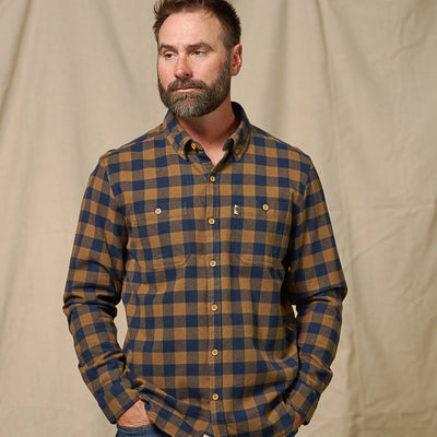 Styled photo of Waxhaw Flannel Shirt Navy and Brown Buffalo Plaid worn outdoors – rugged casual men’s fall outfit