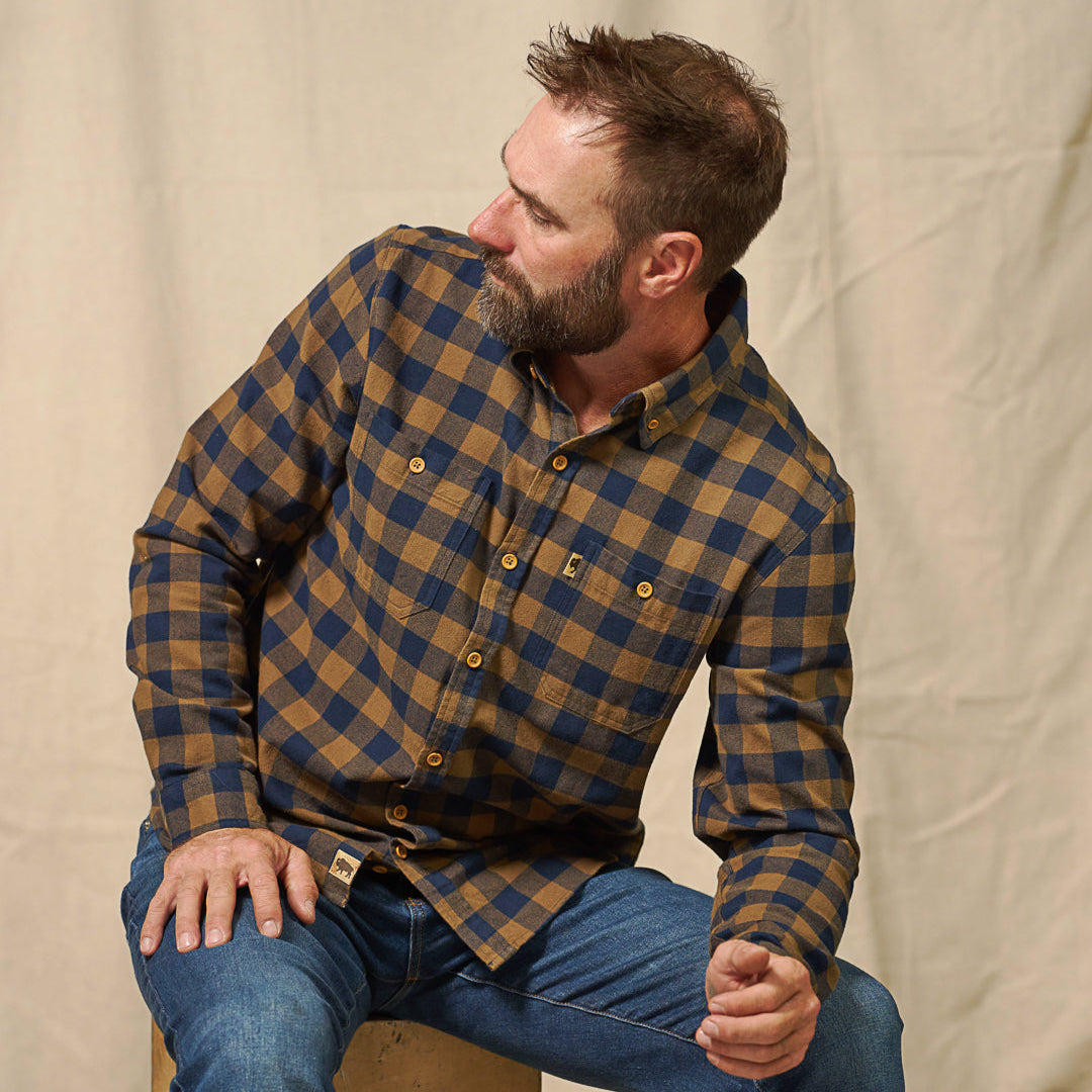 Model wearing Waxhaw Buffalo Plaid Flannel Shirt Navy and Brown – true to size, relaxed fit workshirt silhouette