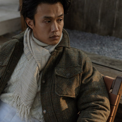 Man in the Aberdeen Wool Jacket in Fir Heather with a gray scarf