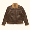 Stylish brown bomber jacket with a shearling collar, emphasizing its cozy and rugged look.