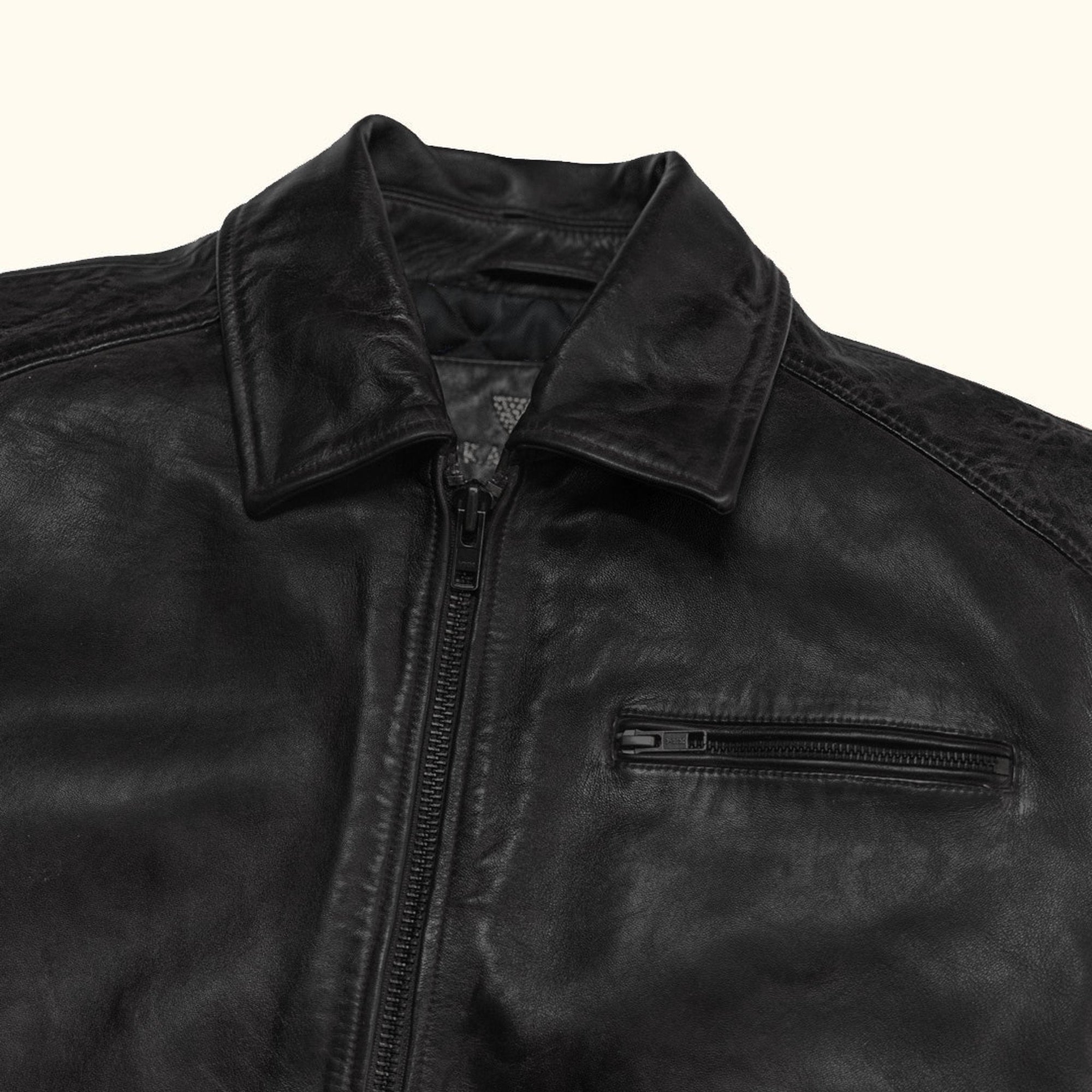 Glenwood Leather Driving Jacket in Vintage Black, zippered chest pocket detail.