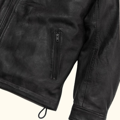 Glenwood Leather Driving Jacket in Vintage Black, sleeve and hem detail with zip pull.