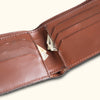Stylish brown leather billfold wallet showcasing a clean, sophisticated look and durable construction.