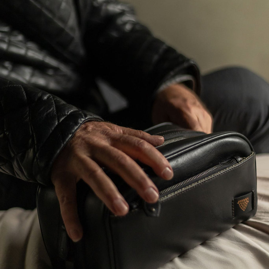 Jefferson Leather Dopp Kit in Vintage Black, front three-quarter view.