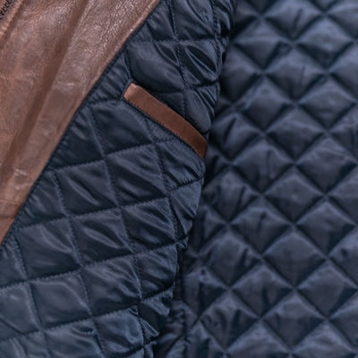 High-quality quilted leather jacket in mahogany brown, offering both warmth and elegance.