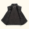 The classic black quilted design of this leather vest makes it a versatile addition to your collection, ideal for both casual and formal settings.
