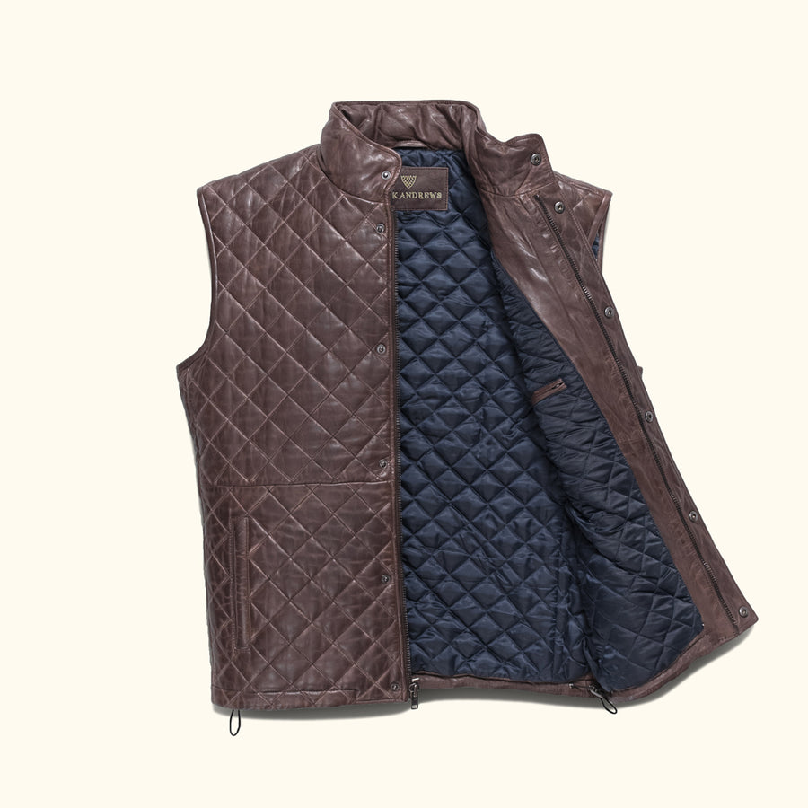 Mahogany brown quilted leather vest with a high collar and snap buttons, displayed flat.