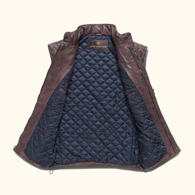 Mahogany brown quilted leather vest with a front snap closure and high collar.