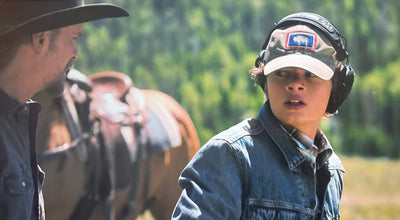 Tate Dutton wearing the Buffalo Jackson Vintage Wyoming State Flag Hat on Marshals (shown in the Green/Grey colorway)