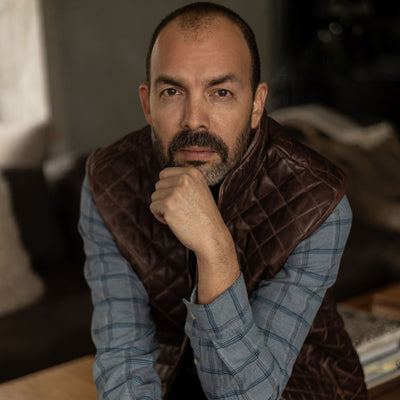 Windsor Cotton Shirt in Sky Pane under a quilted leather vest